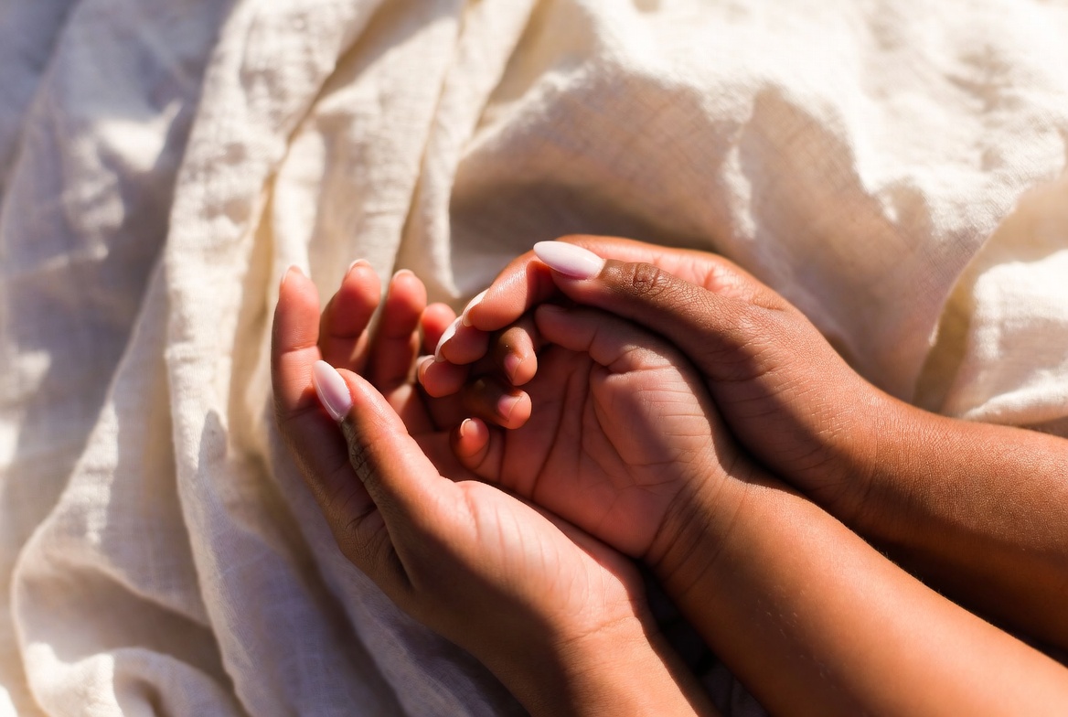 Mother and child hands